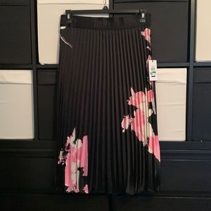 Pleated satin skirt